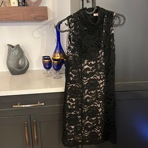 Little black dress with built in beige slip.